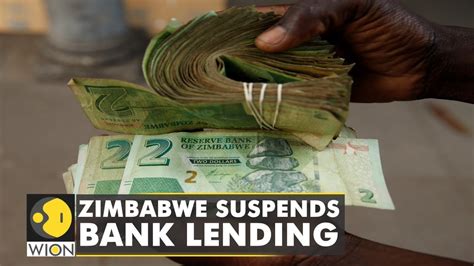 Zimbabwe suspends bank lending in bid to arrest currency decline