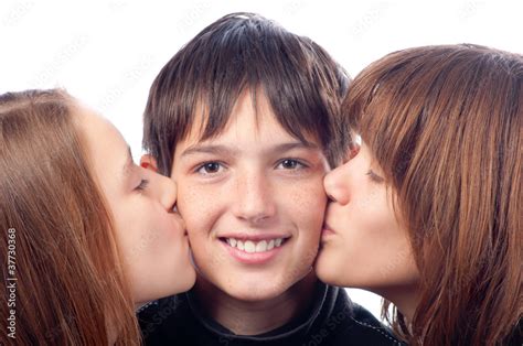 a girl kissing a boy on cheeks videos