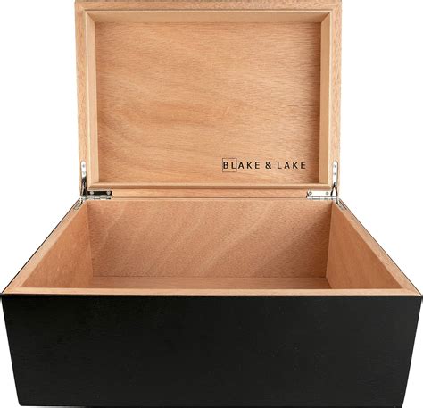 a large wooden box with numbers on it and some nuts in front of the box