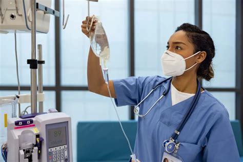 A Rn Working With An Unlicensed Assistive Personnel