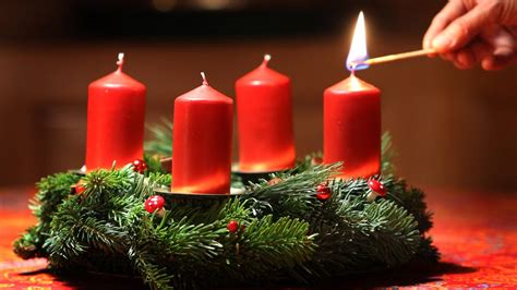 advent kerzen in der hand
