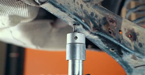 bilen sjunkit ner fjäder