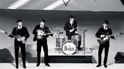 biography of the beatles members and instruments