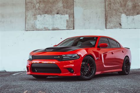 Fiery Fusion: Unleash the Black and Red Charger's Boldness on the Road