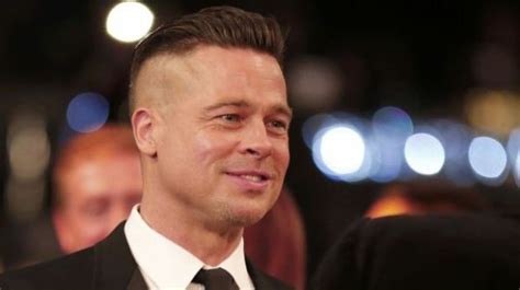Brad Pitt estrena su nuevo look con el pelo largo