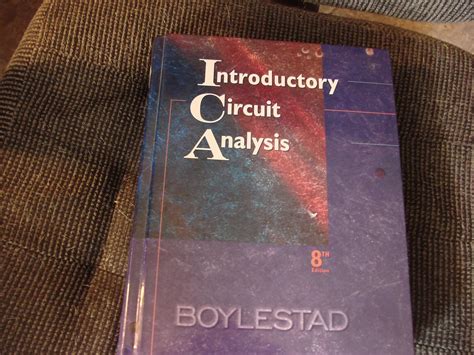By Robert L Boylestad Introductory Circuit Analysis 11th Edition 11th Eleventh Edition Hardcover