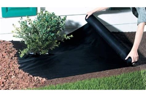Can You Lay Landscape Fabric Over Grass Under Mulch?