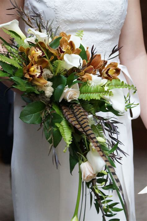 Cascading Wedding Bouquets With Feathers