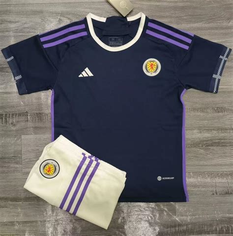 th?q=cheap+kids+football+kits+scotland+baby+strips