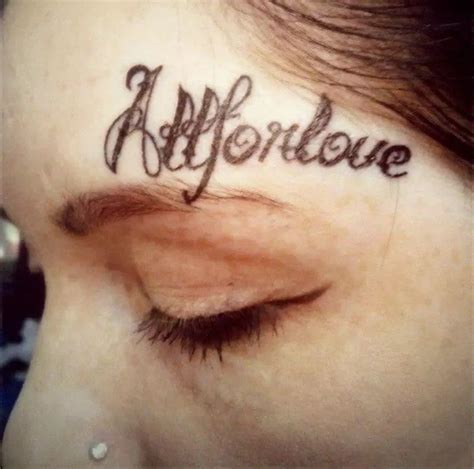 crown above eyebrow tattoo Zachariah Fischer