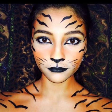 Descubre la mejor pintura de cara de tigre para un maquillaje salvaje y realista