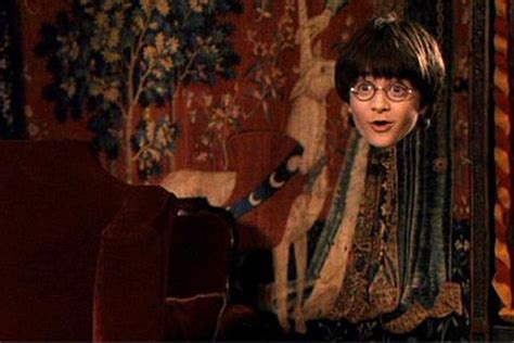 dorky guy with harry potter s invisibility cloak