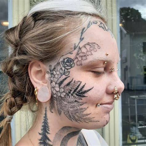 female face tattoo