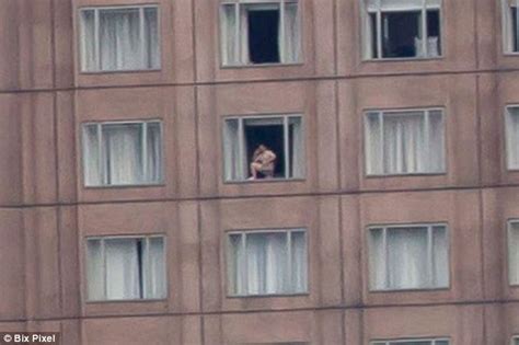 Flashing In Hotel Window