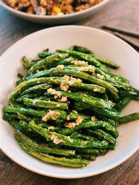 green beans-garlic stir-fried in browned butter.