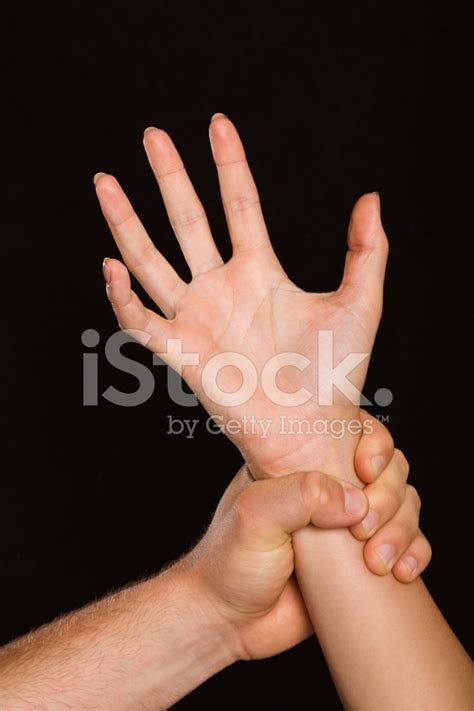 hand grabbing arm