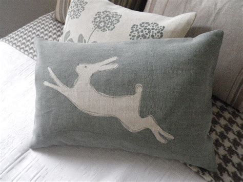 hand printed sage leaf blue leaping hare cushion cover - Pinterest