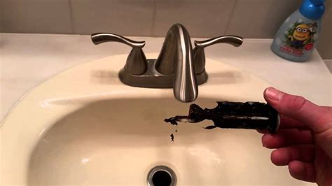 How Do You Clean Gunk Out Of Bathroom Sink?