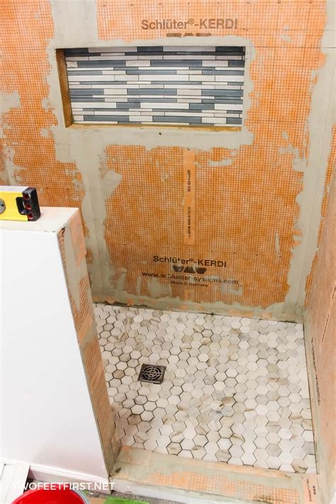 how far do you tile up a bathroom wall?