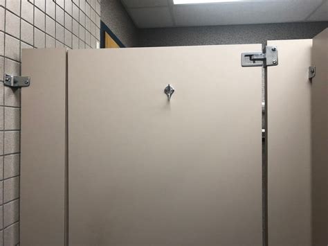 how to fill gap in bathroom stalls?