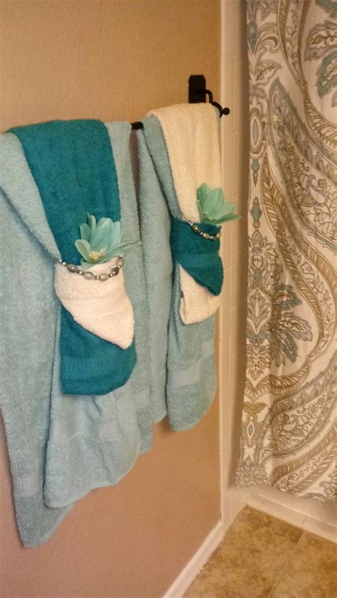 How To Fold Bathroom Towels On 5 Teir Rack?