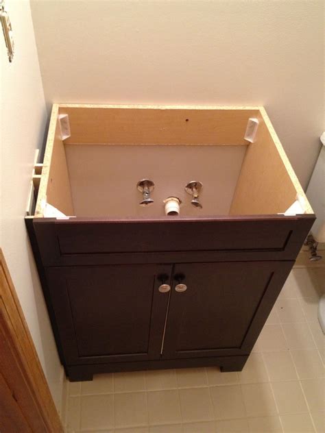 how to install bathroom vanity sink to wall?