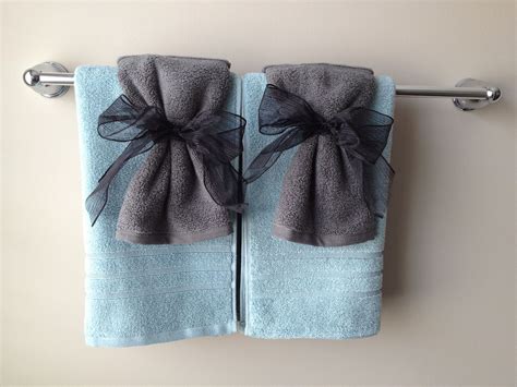 how to make 2 towels look nice in the bathroom?