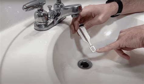 How To Reattach Drain Plug In Bathroom Sink?