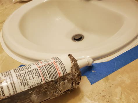How To Remove Caulking From Around A Bathroom Sink?