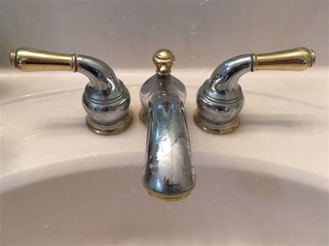 How To Remove Moen Two Handle Bathroom Faucet?