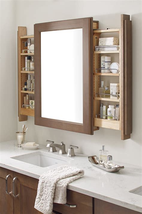 how to slide out bathroom mirror?