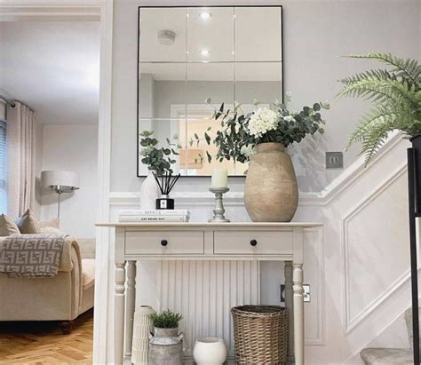 how high to hang mirror over console table