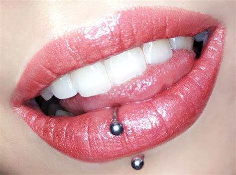 how long should a lip piercing be swollen