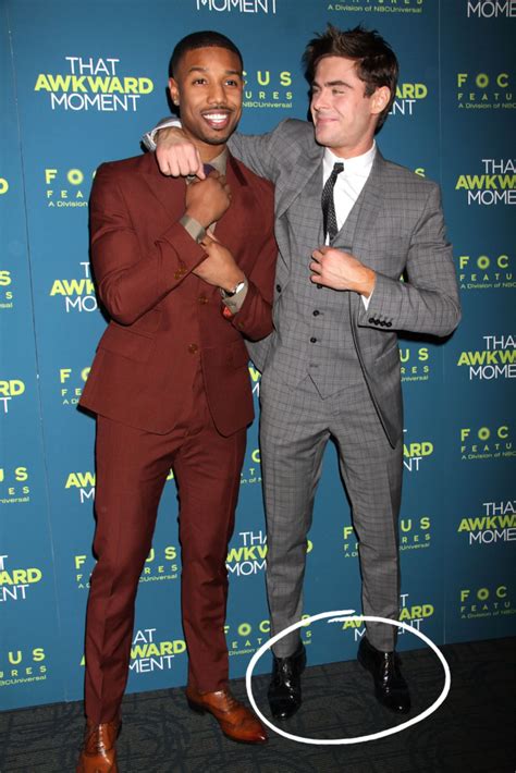 how tall is zac efron in feet