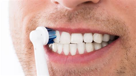 how to brush with receding gums