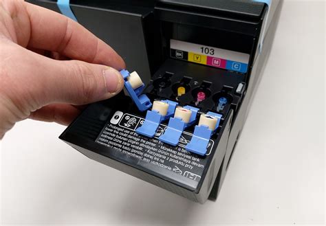 how to change ink in epson printer