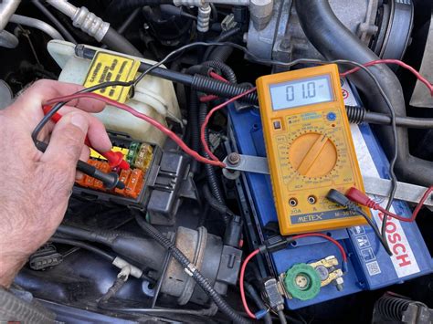 how to check battery drain in car