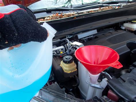 how to put windshield fluid in car