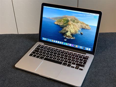 hur mycket väger macbook pro 13