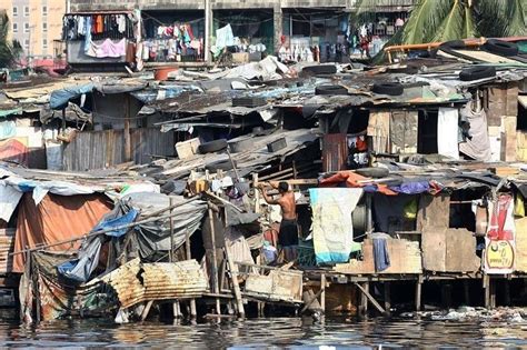 informal settler, politically correct term for slum dwellers