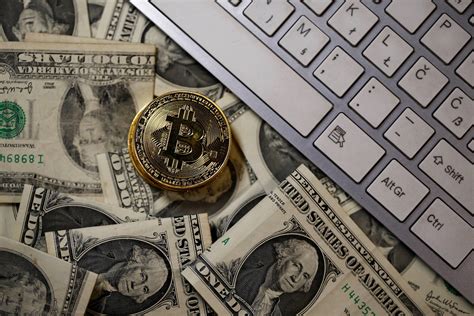 kiek šiandien verta 100 USD investicija į bitkoiną