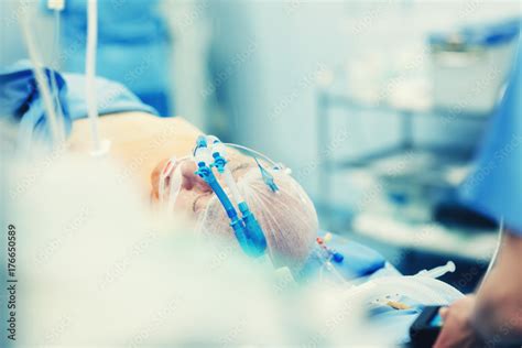 intubated patient in hospital, intubatation at intensive care unit room