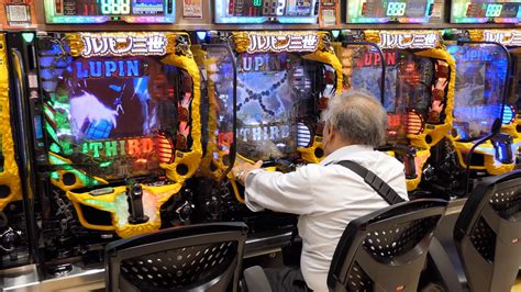 Japanese People Playing Pachinko  Lottery  Arcade Game  Video Games  Gambling  Slot Machines In Asian Casino  Tokyo  Japan  Asia Stock Photo - Asian Games Slot