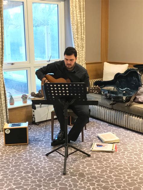 Justin plays the guitar  Signature Care Homes