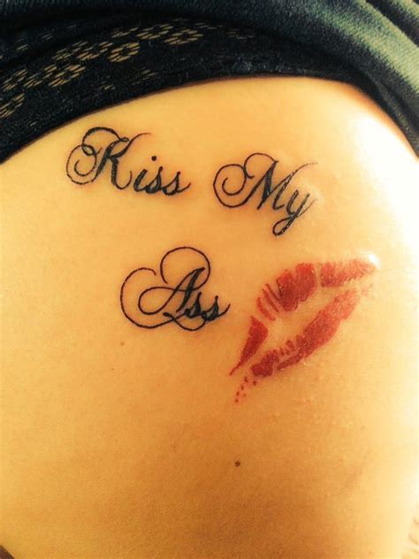 kiss on cheek tattoo meaningful