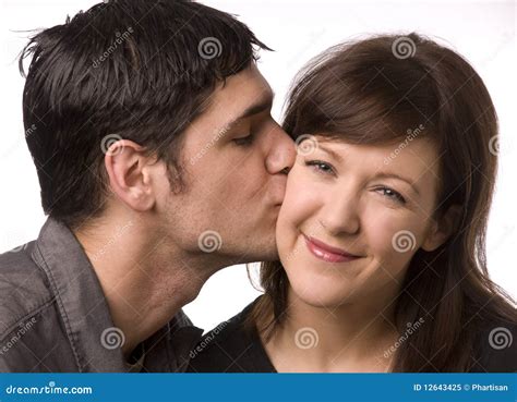 kissing someone on the cheek is called