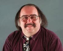 larry alexander author biography in the background