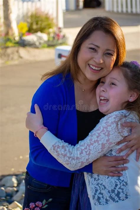 Latina mom and daughter