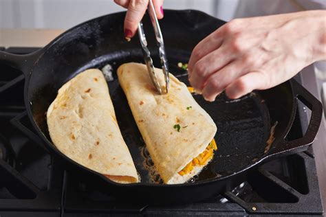 making quesadillas in a pan