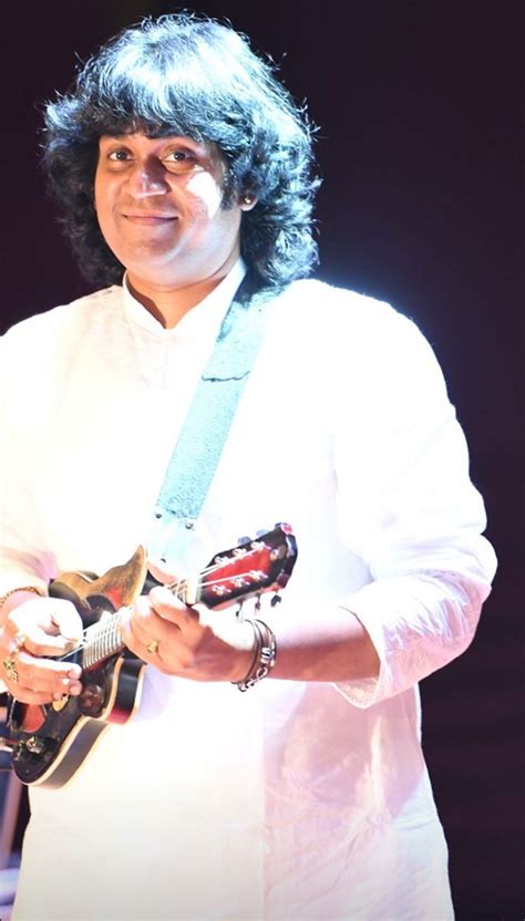 mandolin rajesh biography definition